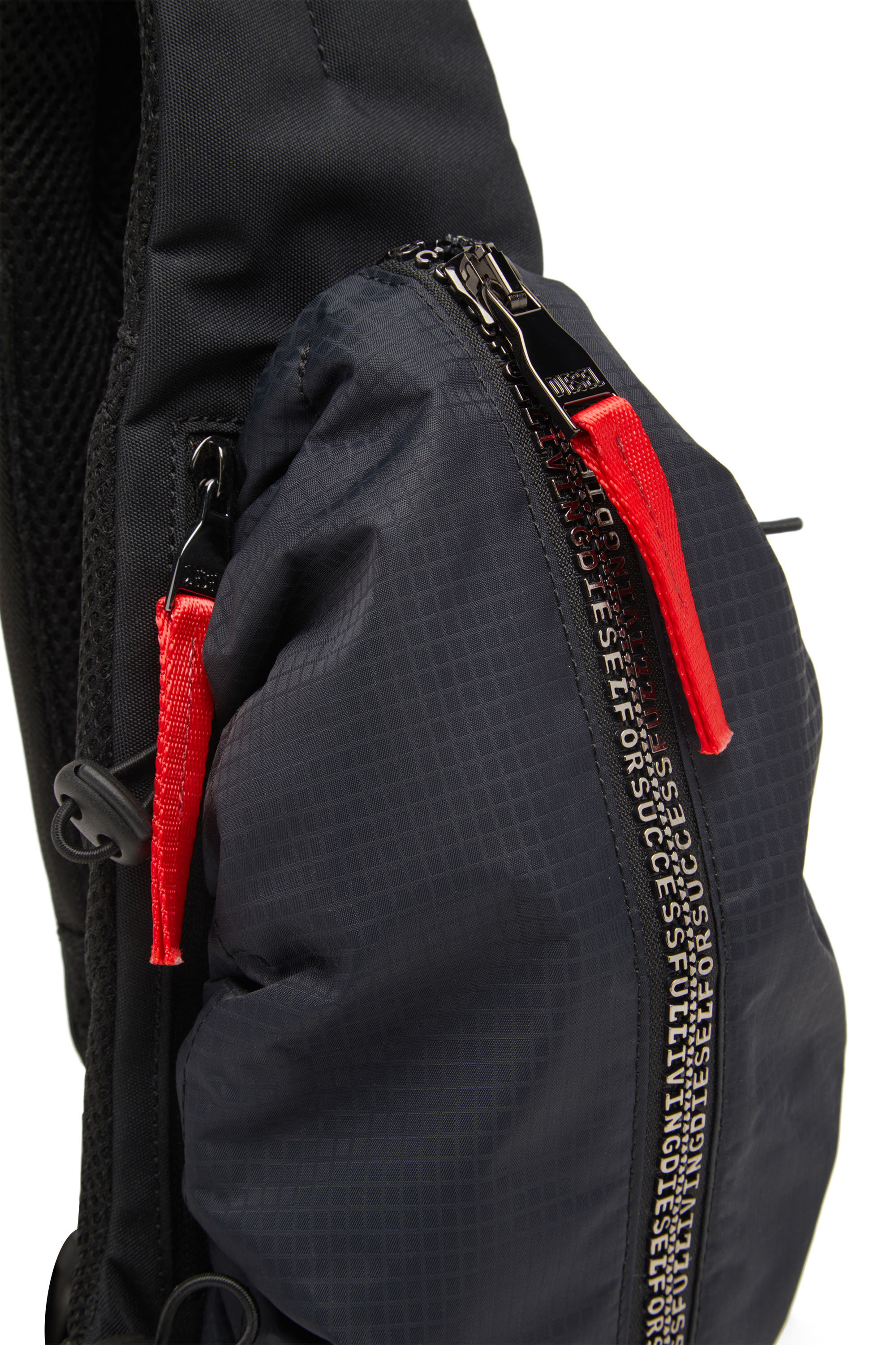Men s Zip D Sling bag in check jacquard shell Black Diesel
